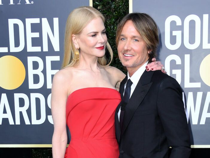 Nicole Kidman con vestido rojo con Keith Urban de traje en los Globos de Oro