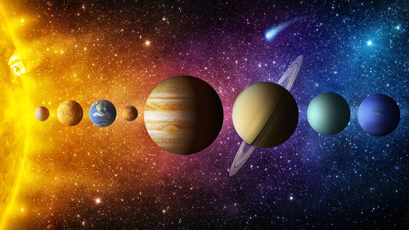 Meie päikesesüsteemi planeedid vikerkaaregalaktika taustaga.
